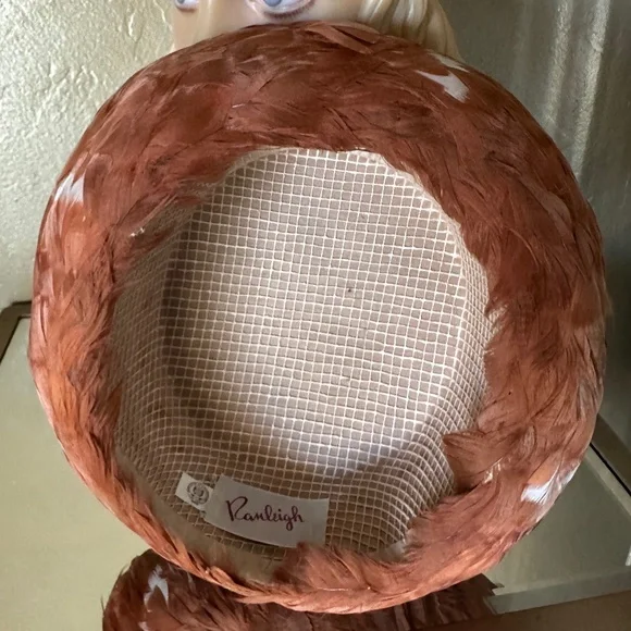 REFINED 1960s' HAT COVERED IN RUST COLORED FEATHERS